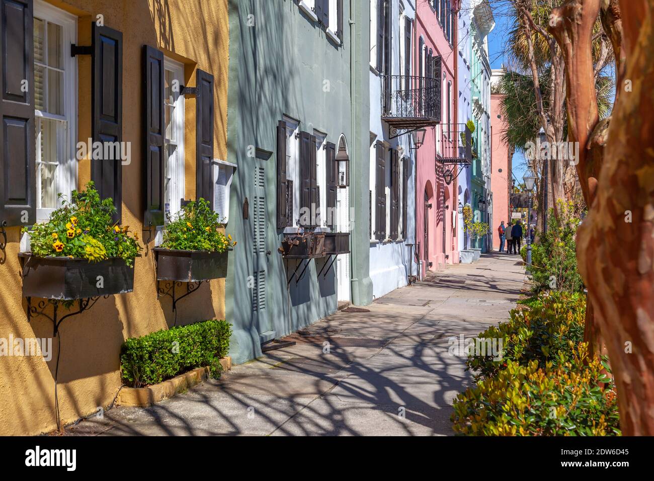 Rainbow Row in the morning, the name for a series of thirteen colorful historic houses in Charleston, South Carolina. Stock Photo