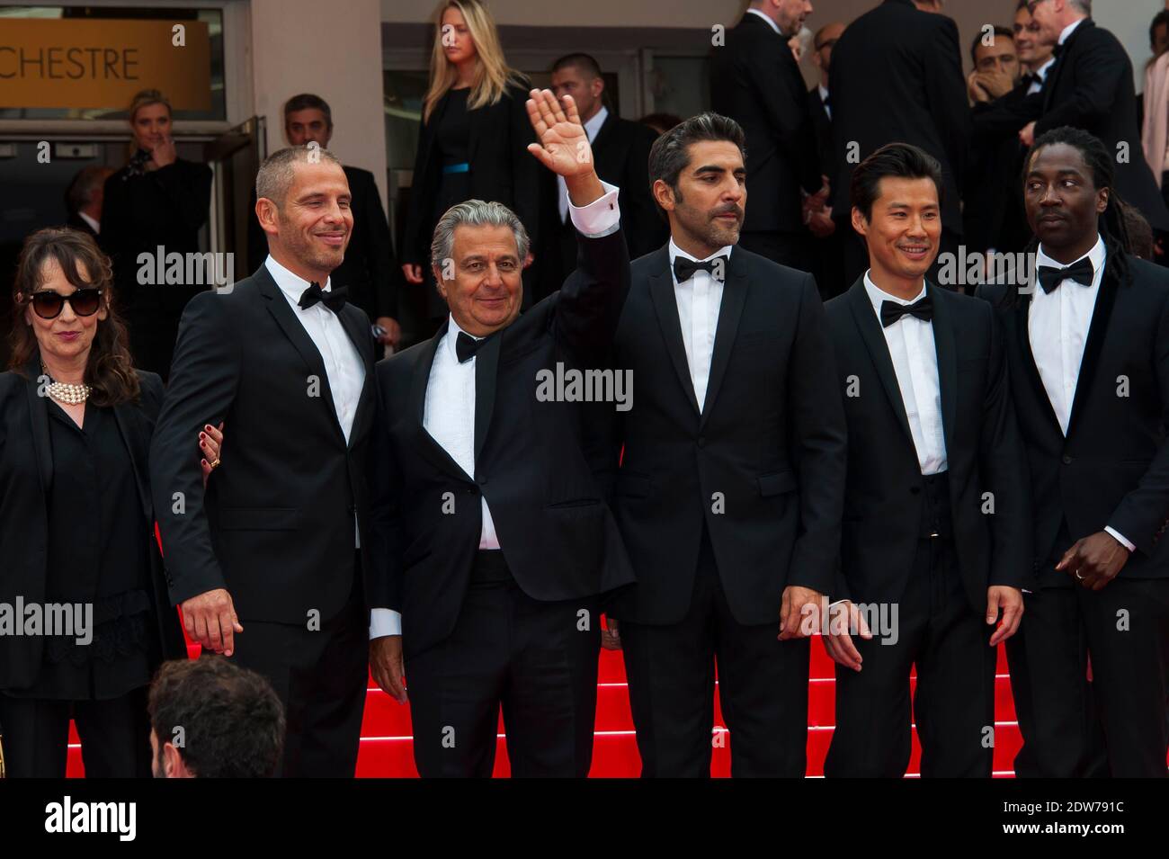 Christian Clavier and Chantal Lauby, Medi Sadoun, Ary Abittan, Frederic  Chau and Noom Diawara arriving at the Palais des Festivals for the  screening of the film Jimmy's Hall presented in competition as
