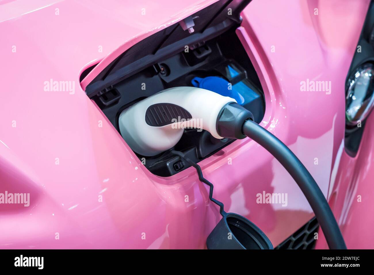 Electric Car Charging At Vehicle Charging Station Stock Photo Alamy