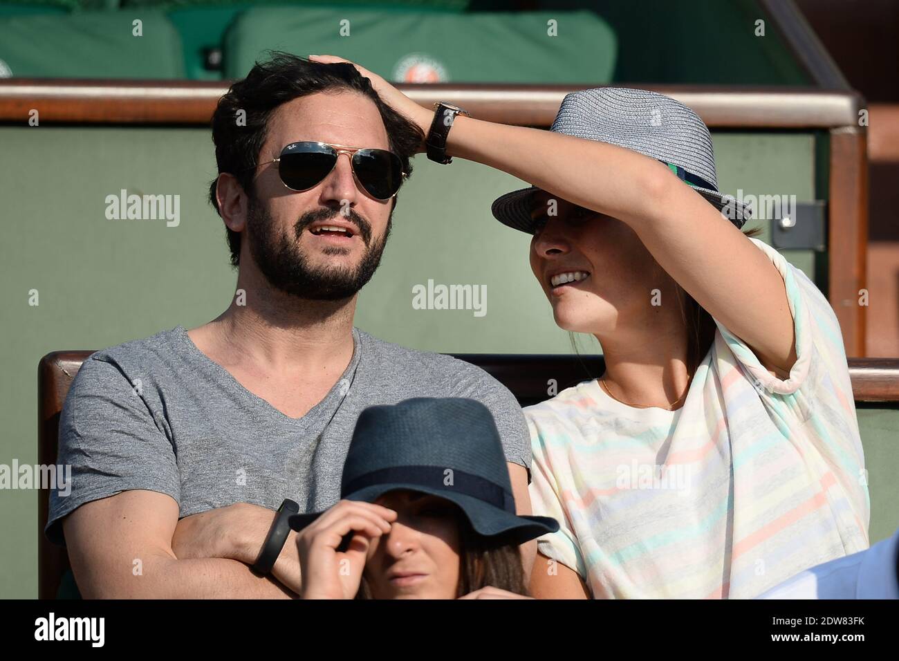 Julie de Bona and her husband watching a 3rd round game in the French