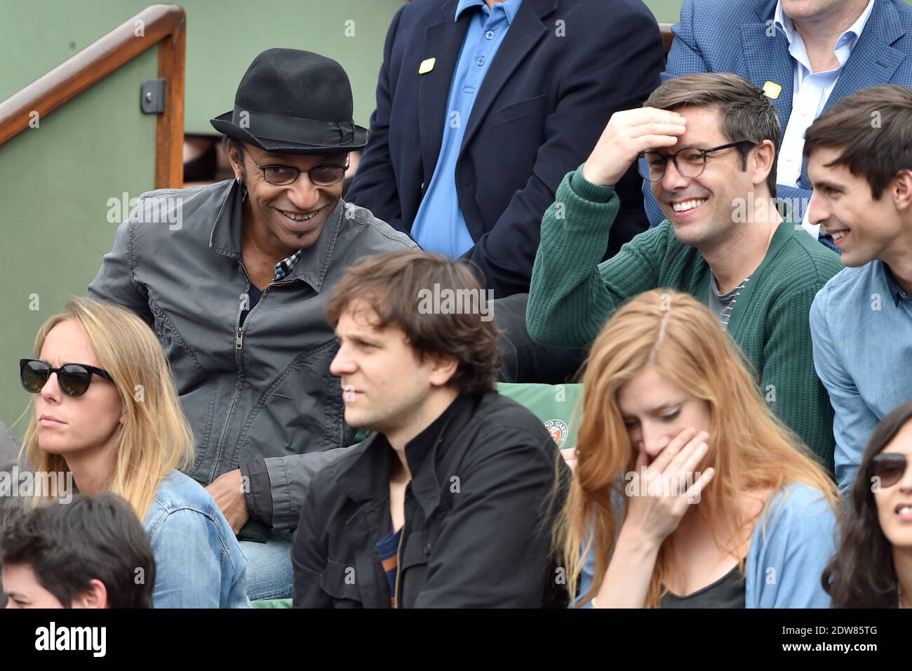 Manu Katche and Stephane Jarny watching a game during the French Tennis  Open at Roland Garros arena in Paris, France, on June 1, 2014. Photo by  Nicolas Gouhier/ABACAPRESS.COM Stock Photo - Alamy