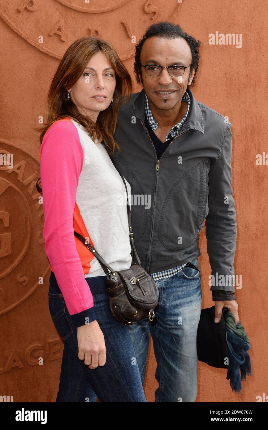 Manu Katche and wife Laurence stopping by the Village, the VIP quarter of  the French Tennis Open 2014 at Roland Garros arena in Paris, France, on  June 1, 2014. Photo by Laurent