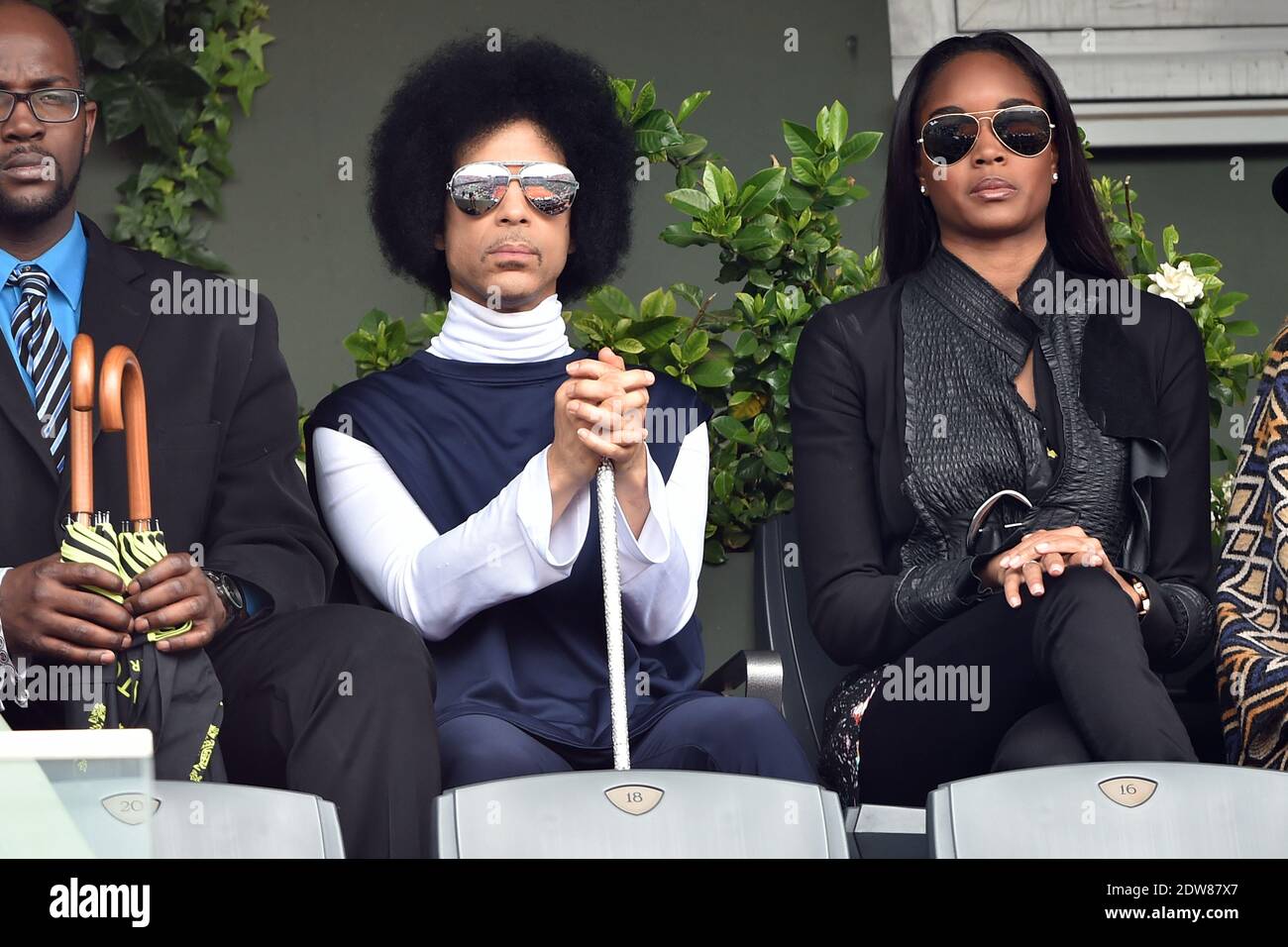 Singer Prince watches from the stands Spain's Rafael Nadal playing Serbia's  Dusan Lajovic in their eight-final of the French Tennis Open at Roland  Garros Stadium in Paris, France, June 2, 2014. Photo