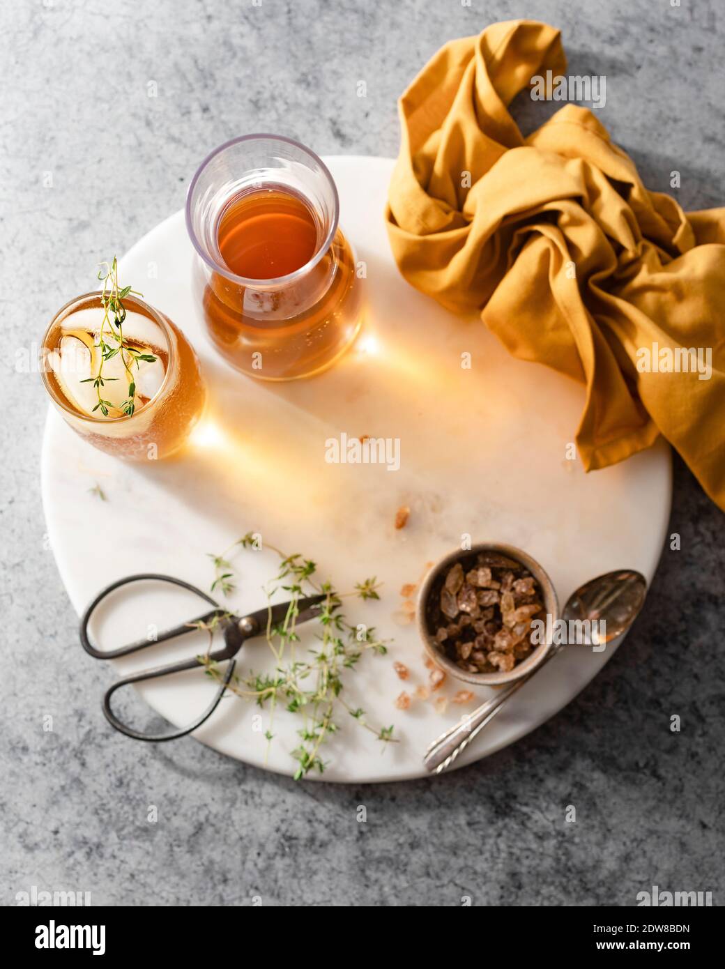 Yellow iced tea with Thyme Stock Photo