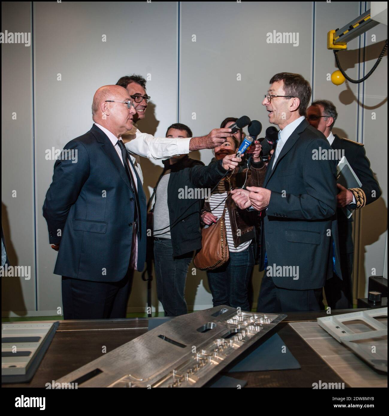 Michel Sapin, flanked by CERPI CEO Louis Ristic , visits CERPI, (company specializing in the manufacture of parts for the aeronautical) in Saint-Ouen-L'Aumone, France on June 5, 2014. Photo by Renaud Khanh/ABACAPRESS.COM Stock Photo