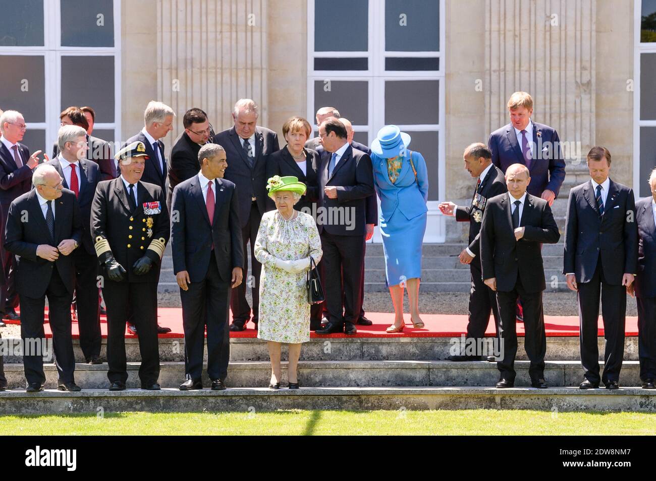 US President Barack Obama participates in a group photo of world leaders attending the D-Day 70th Anniversary ceremonies at Chateau de Benouville in Benouville, France, June 6, 2014. The D-Day ceremonies mark the 70th anniversary of the launching of 'Operation Overlord', a vast military operation by Allied forces in Normandy, which turned the tide of World War II, eventually leading to the liberation of occupied France and the end of the war against Nazi Germany. Photo by Christophe Petit Tesson/Pool/ABACAPRESS.COM Stock Photo