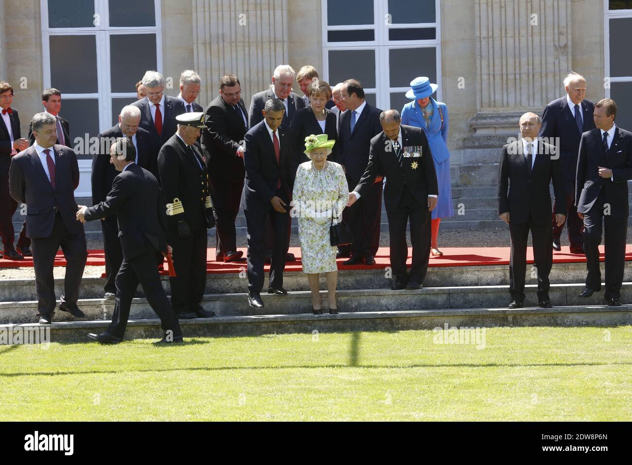 US President Barack Obama participates in a group photo of world leaders attending the D-Day 70th Anniversary ceremonies at Chateau de Benouville in Benouville, France, June 6, 2014. The D-Day ceremonies mark the 70th anniversary of the launching of 'Operation Overlord', a vast military operation by Allied forces in Normandy, which turned the tide of World War II, eventually leading to the liberation of occupied France and the end of the war against Nazi Germany. Photo by Denis Allard/Pool/ABACAPRESS.COM Stock Photo
