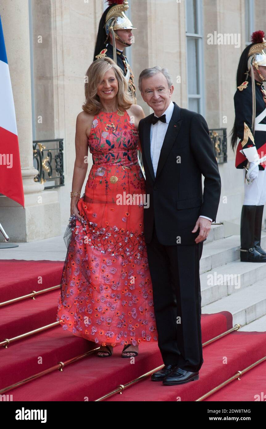 Bernard Arnault and Helene Arnault attend the State Banquet given in honour of HM The Queen Elizabeth II by French President Francois Hollande at the Elysee Palace, as part of the official ceremonies of the 70th Anniversary of the D Day, on June 6, 2014, in Paris, France. Photo by Thierry Orban/ABACAPRESS.COM Stock Photo