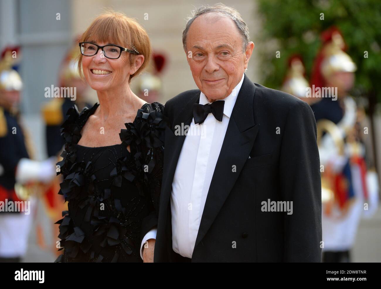Former Prime Minister Michel Rocard and his wife Sylvie Rocard attend the State Banquet given in honour of HM The Queen Elizabeth II by French President Francois Hollande at the Elysee Palace, as part of the official ceremonies of the 70th Anniversary of the D Day, on June 6, 2014, in Paris, France. Photo by Christian Liewig/ABACAPRESS.COM Stock Photo