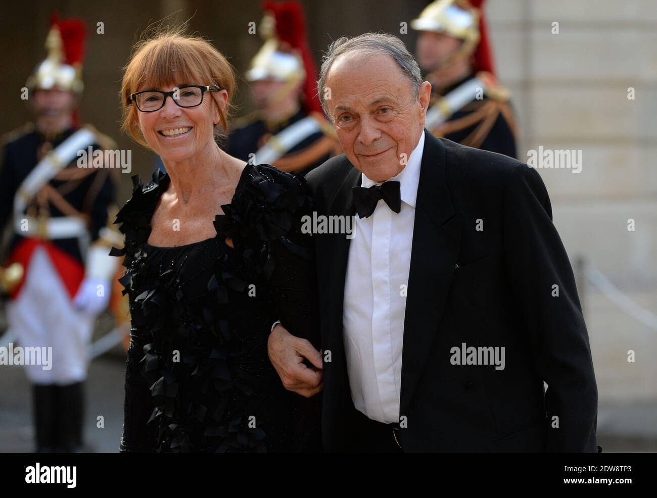 Former Prime Minister Michel Rocard and his wife Sylvie Rocard attend the State Banquet given in honour of HM The Queen Elizabeth II by French President Francois Hollande at the Elysee Palace, as part of the official ceremonies of the 70th Anniversary of the D Day, on June 6, 2014, in Paris, France. Photo by Christian Liewig/ABACAPRESS.COM Stock Photo