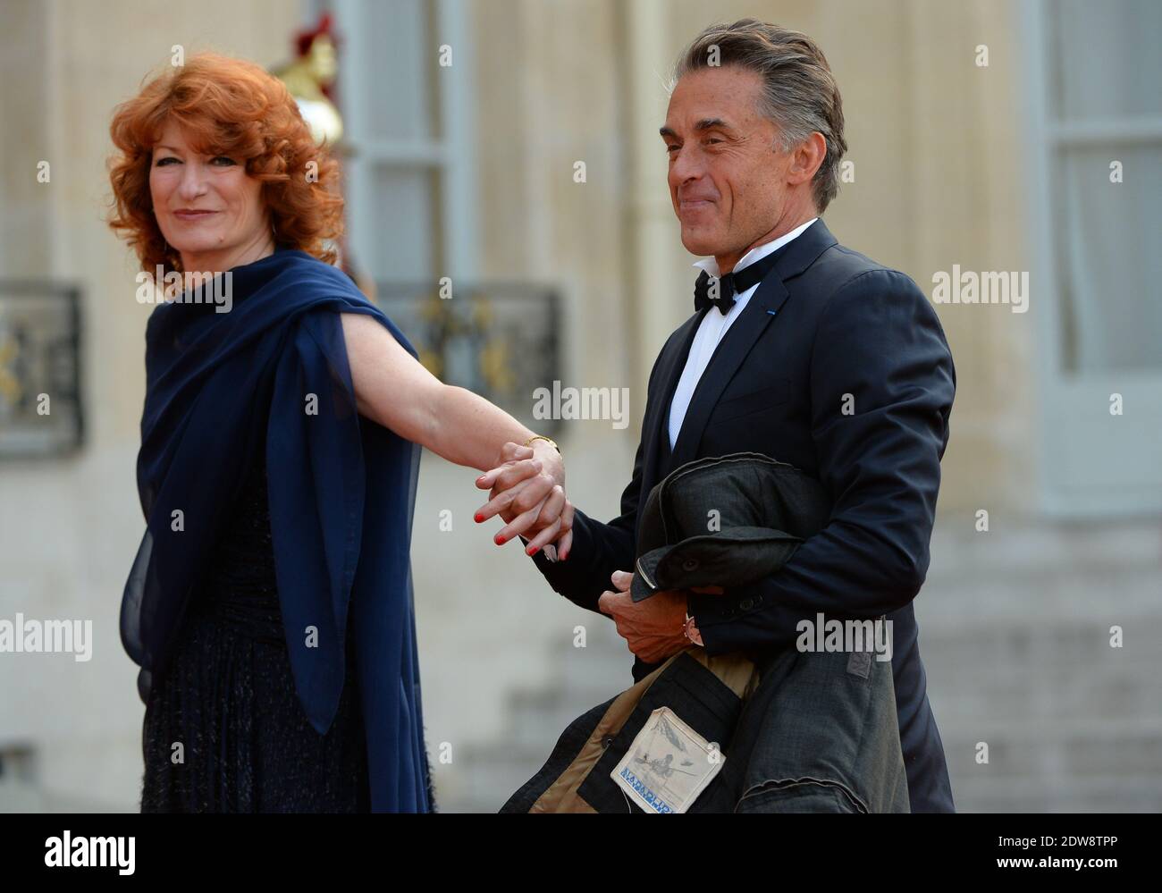 Gerard Holtz and Muriel Mayette attend the State Banquet given in honour of HM The Queen Elizabeth II by French President Francois Hollande at the Elysee Palace, as part of the official ceremonies of the 70th Anniversary of the D Day, on June 6, 2014, in Paris, France. Photo by Christian Liewig/ABACAPRESS.COM Stock Photo