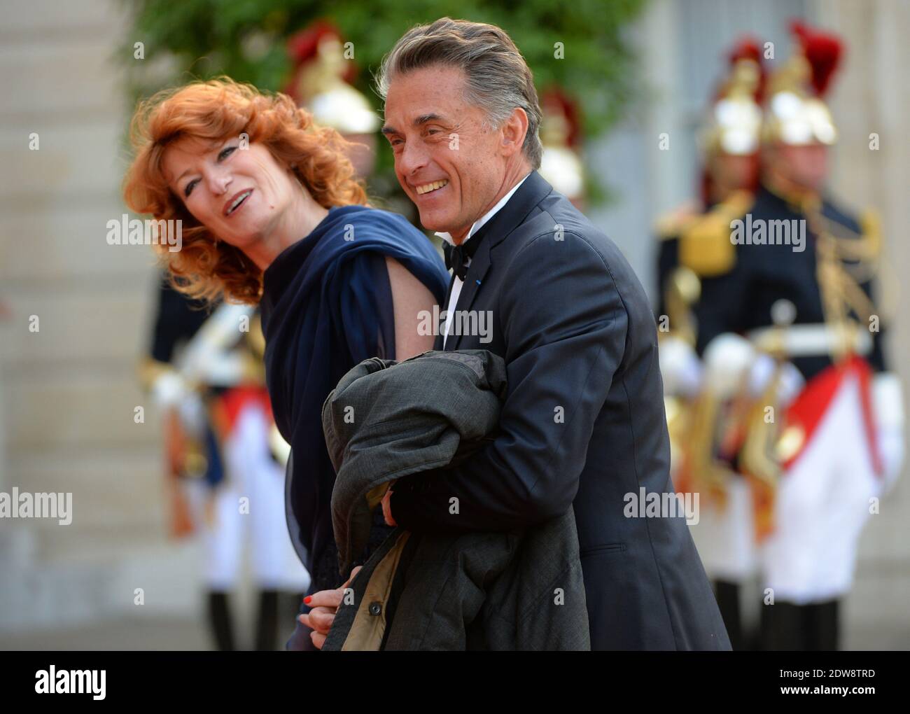 Gerard Holtz and Muriel Mayette attend the State Banquet given in honour of HM The Queen Elizabeth II by French President Francois Hollande at the Elysee Palace, as part of the official ceremonies of the 70th Anniversary of the D Day, on June 6, 2014, in Paris, France. Photo by Christian Liewig/ABACAPRESS.COM Stock Photo