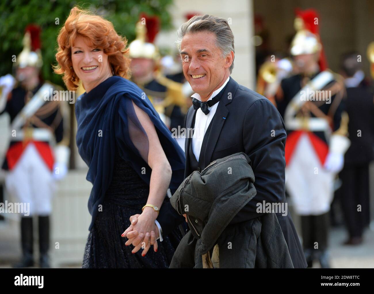 Gerard Holtz and Muriel Mayette attend the State Banquet given in honour of HM The Queen Elizabeth II by French President Francois Hollande at the Elysee Palace, as part of the official ceremonies of the 70th Anniversary of the D Day, on June 6, 2014, in Paris, France. Photo by Christian Liewig/ABACAPRESS.COM Stock Photo