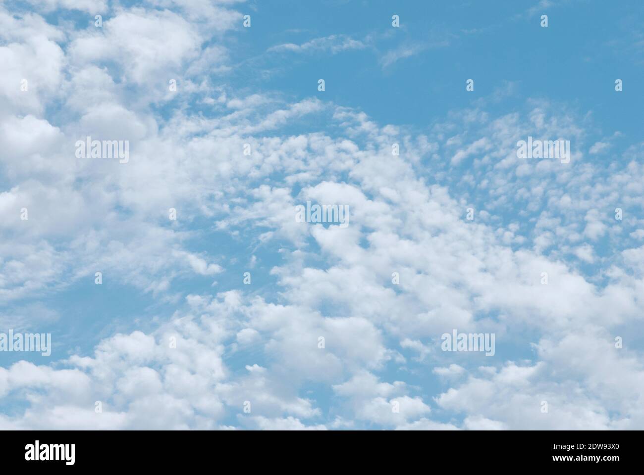 light summer cirrus clouds in blue sky Stock Photo