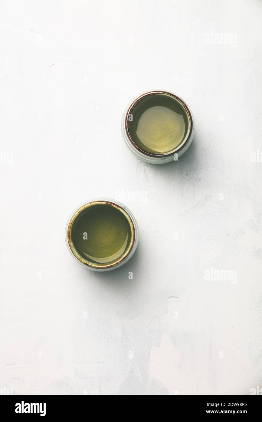 Tea composition, green tea on grey concrete background, flat lay Stock Photo