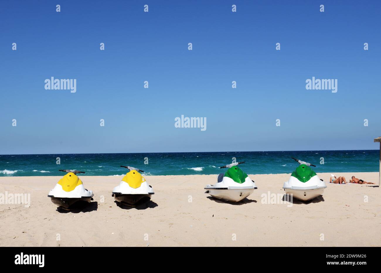Al Rashed Beach Tourist sunbathing on the beautiful beach in Ras Al Hadd in Oman Stock ...