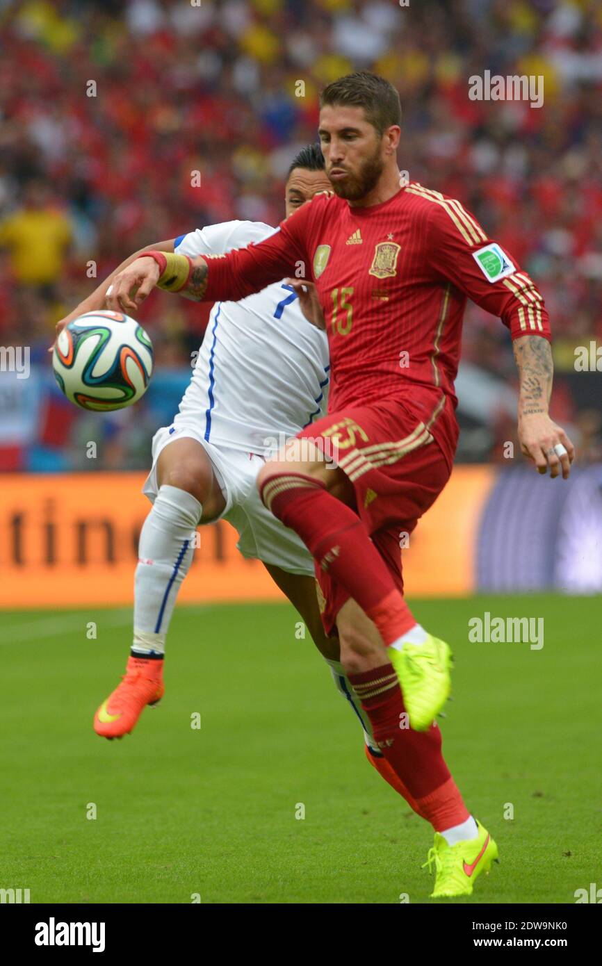 Spain's Sergio Ramos battling Chile's Alexis Sanchez during Soccer World Cup 2014 First round Group B match Spain v Chile at Maracana Stadium, Rio de Janeiro, Brazil , on June 18, 2014. Chile won 2-0 and ousted the defending champions from the competition. Photo by Henri Szwarc/ABACAPRESS.COM Stock Photo