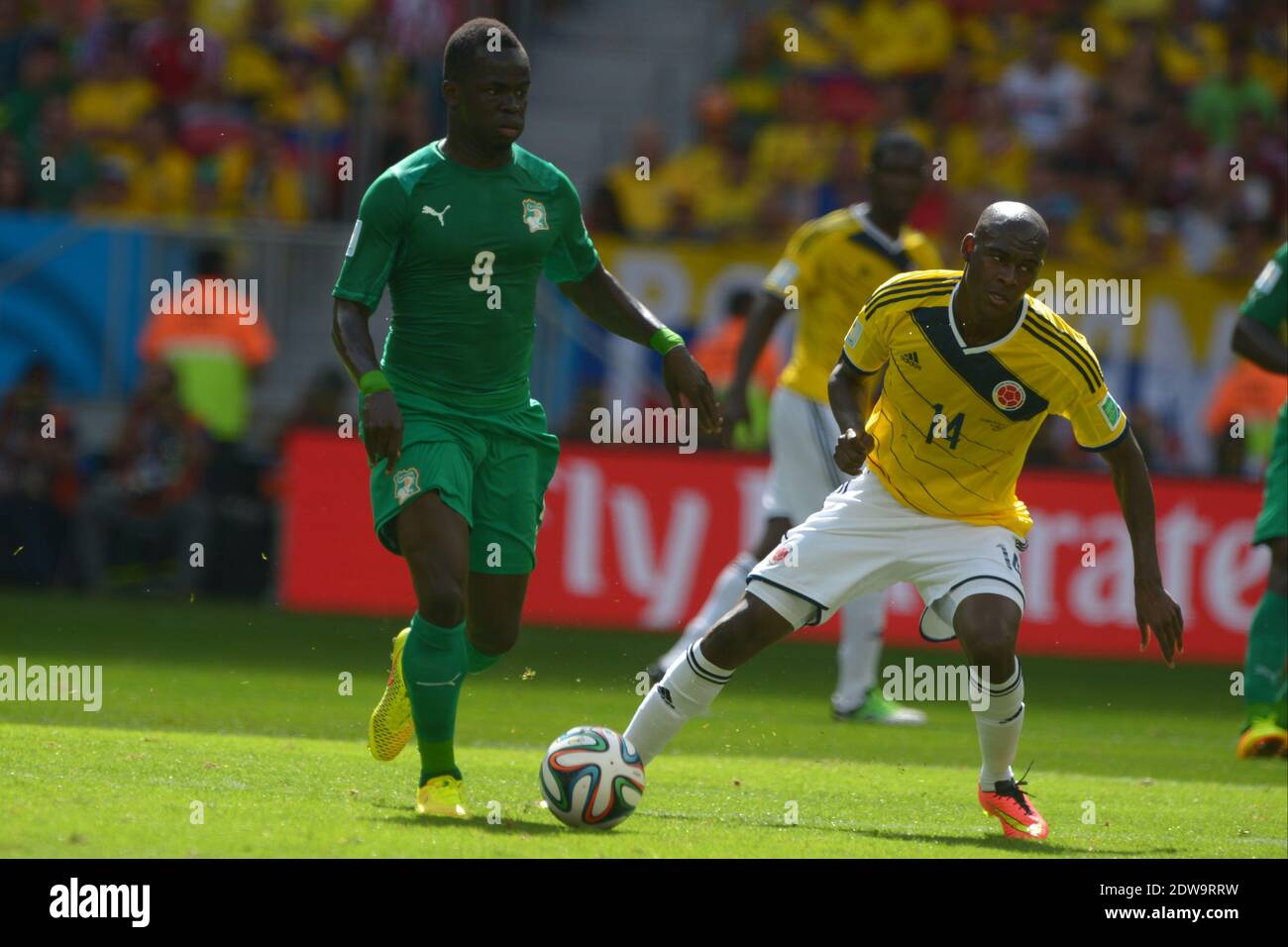Colombia's Victor Ibarbo battling Ivory Coast's Ismael Tiote during soccer World Cup 2014 First round Group D match Colombia v Ivory Coast at National Stadium, Brasilia, Brazil , on June 19, 2014. Colombia won 2-1. Photo by Henri Szwarc/ABACAPRESS.COM Stock Photo