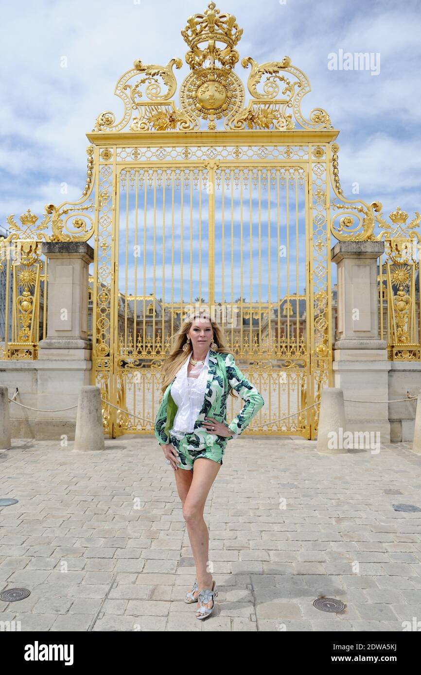 Exclusive Jackie Siegel poses at the Chateau de Versailles, near