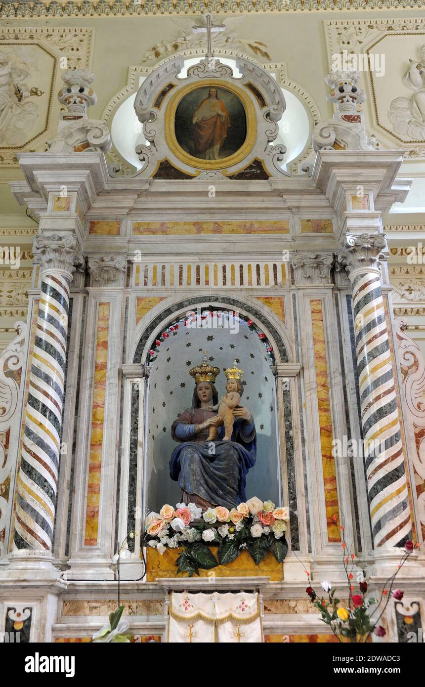 Above the town of San Luca is the shrine of Our Lady of Polsi, the spiritual focus of an organisation that leans heavily on religious symbolism - among the ranks to which its mobsters can aspire are those of 'saint' and 'evangelist'. According to evidence presented during mob trials, 'Ndrangheta bosses gathered here every Sept. 2 to 'baptize' new members, discuss strategies and pray. The town of San Luca, South of Italy on February 2014 is the cradle and the epicenter of the 'Ndrangheta , the calabrian mafia. San Luca, called the 'mother of the 'Ndrangheta' has a population of just over 4,000. Stock Photo