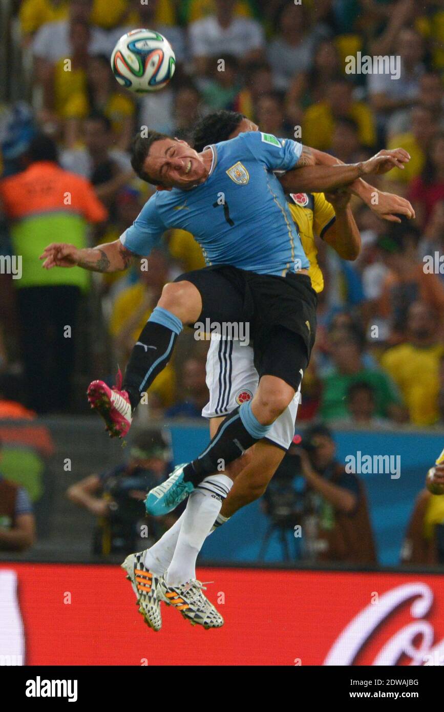 Colombia's Abel Aguilar battling Uruguay's Cristian Rodriguez during Soccer World Cup 2014 1/8 of final round match Colombia v Uruguay at Maracana Stadium, Rio de Janeiro, Brazil on June 28, 2014. Colombia won 2-0. Photo by Henri Szwarc/ABACAPRESS.COM Stock Photo