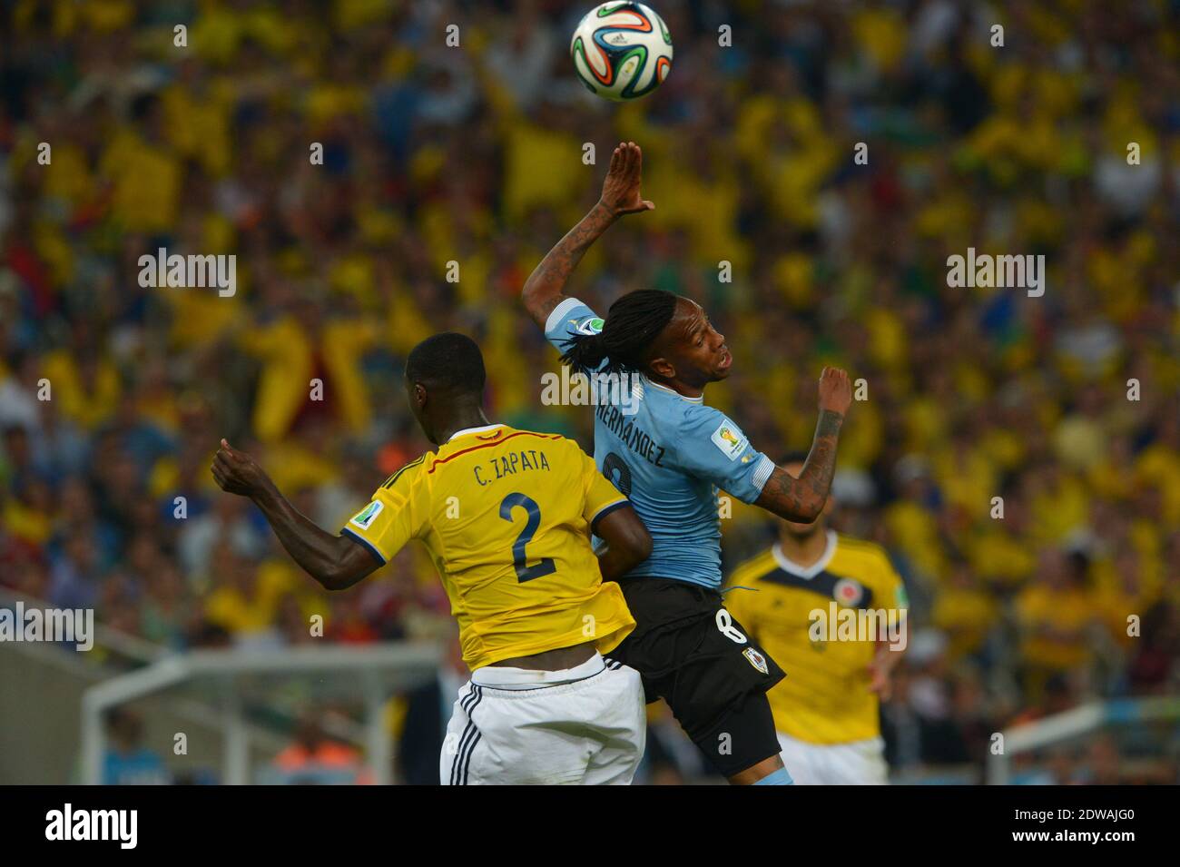 Colombia's Cristian Zapata battling Uruguay's Abel Hernandez during Soccer World Cup 2014 1/8 of final round match Colombia v Uruguay at Maracana Stadium, Rio de Janeiro, Brazil on June 28, 2014. Colombia won 2-0. Photo by Henri Szwarc/ABACAPRESS.COM Stock Photo