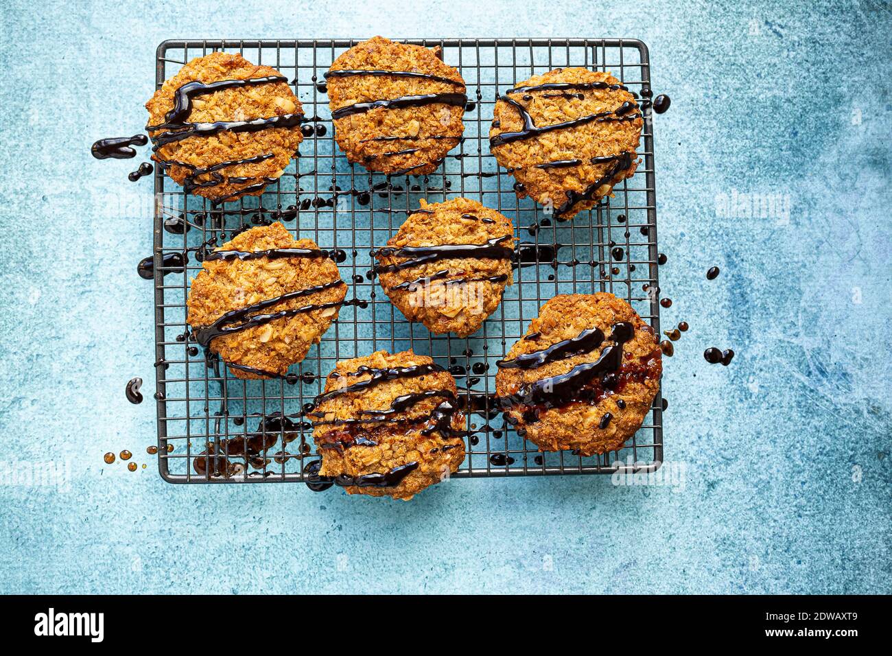 Anazac Biscuits with Chocolate Ganache Drizzle Stock Photo Alamy