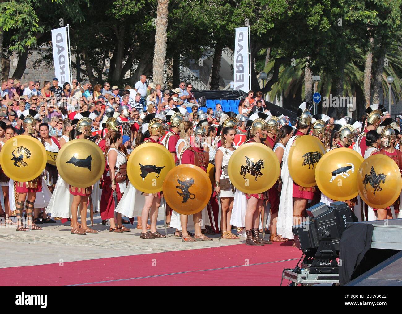 Annual festival in Cartagena, Spain is the Cartaginians and Romans. Here a group dressed as Roman legionaries with an audience lending their support. Stock Photo