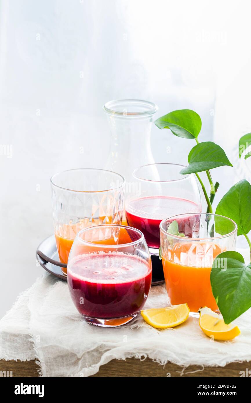 Beet Carrot Apple Juice, Orange Carrot Ginger Juice served in glasses