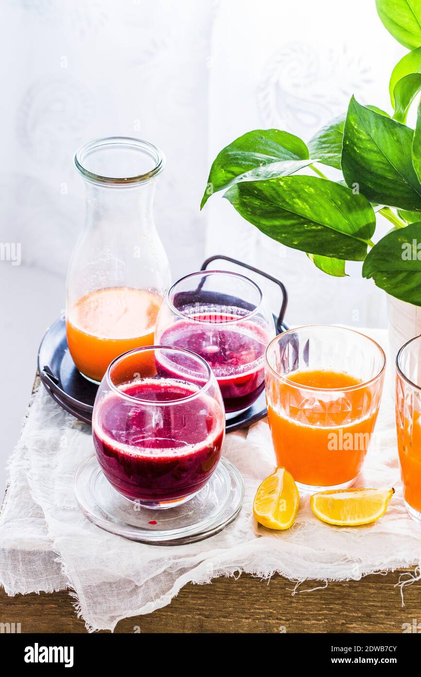 Beet Carrot Apple Juice, Orange Carrot Ginger Juice served in glasses