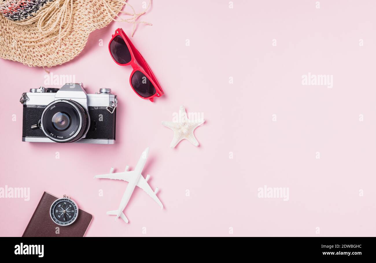 Top view flat lay mockup of retro camera films, airplane, hat, sunglasses,  starfish beach traveler accessories on pink background with copy space, Bus  Stock Photo - Alamy