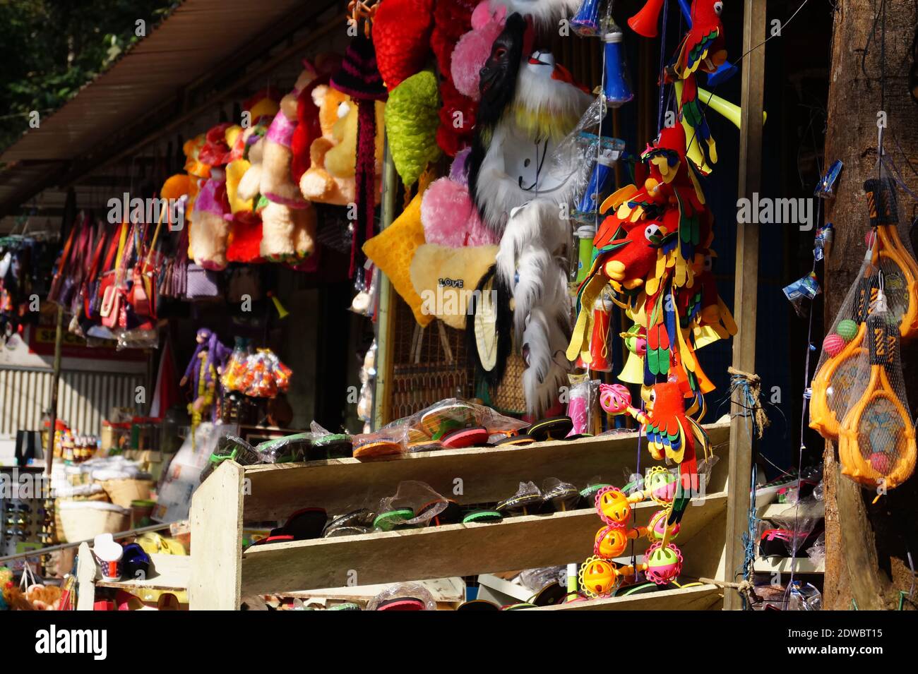 Toys and chappals shop or stall in Wayanad, Kerala, India Stock Photo