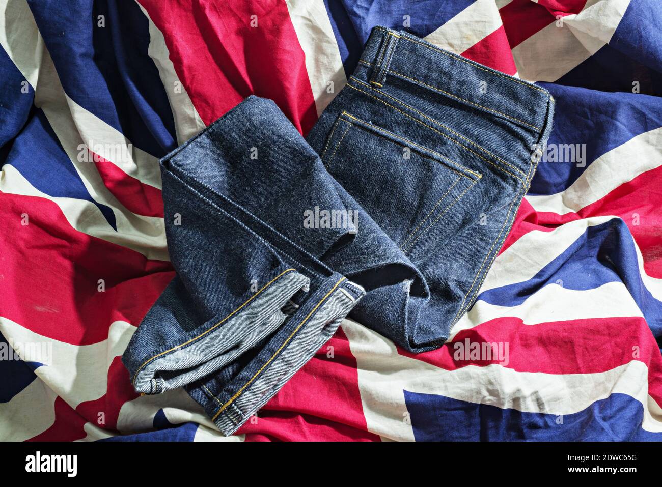 High Angle View Of Denim Jeans On British Flag Stock Photo - Alamy