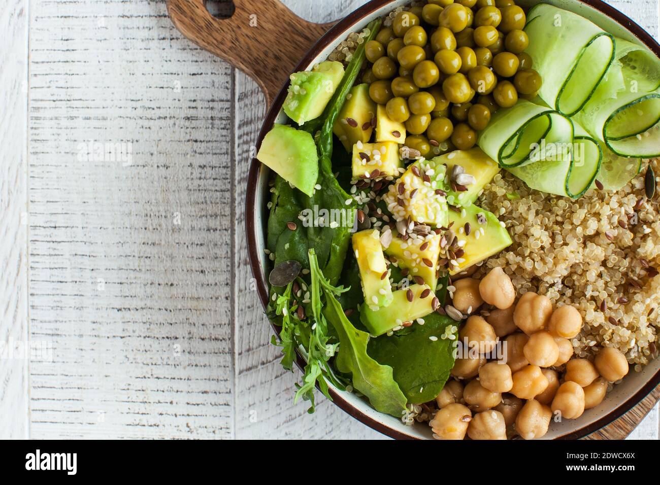 Healthy vegetable lunch from the Buddha bowl with quinoa, avocado