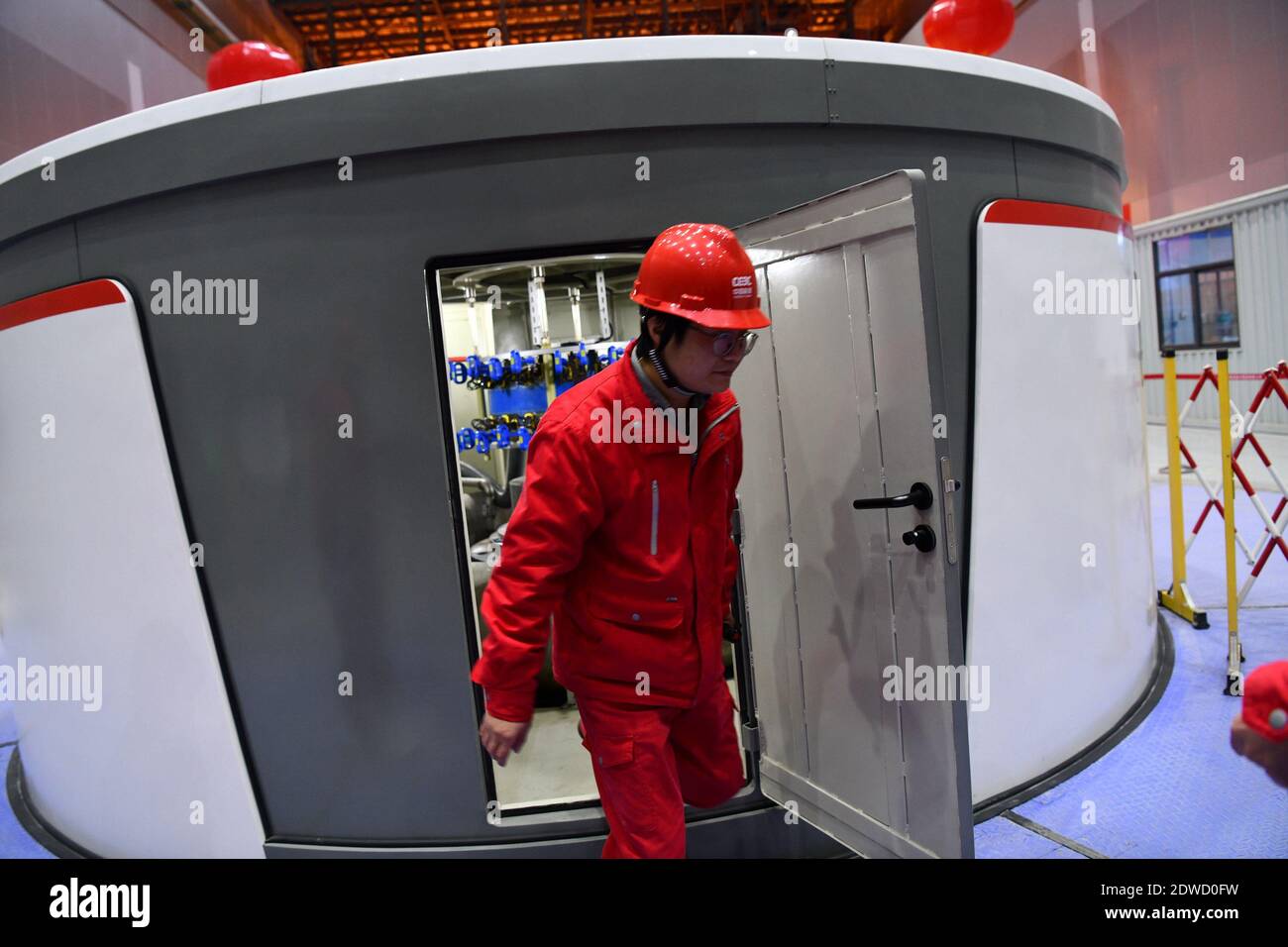 The last turbine unit of the Jixi Pumped-storage Power Station is connected to the grid for power generation, which indicates that China's largest pum Stock Photo