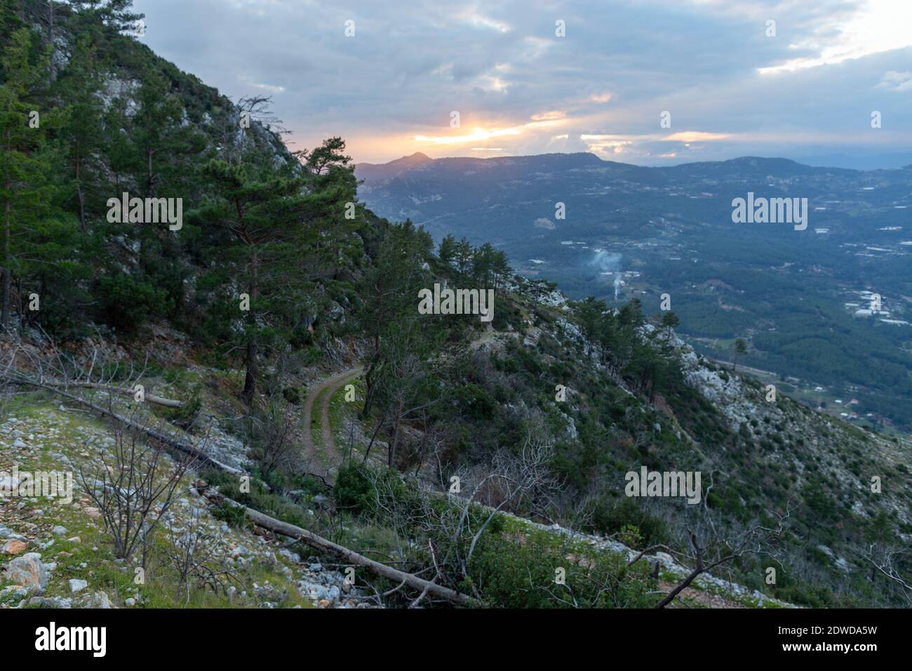 Scenic View Of Mountains Against Sky During Sunset Stock Photo