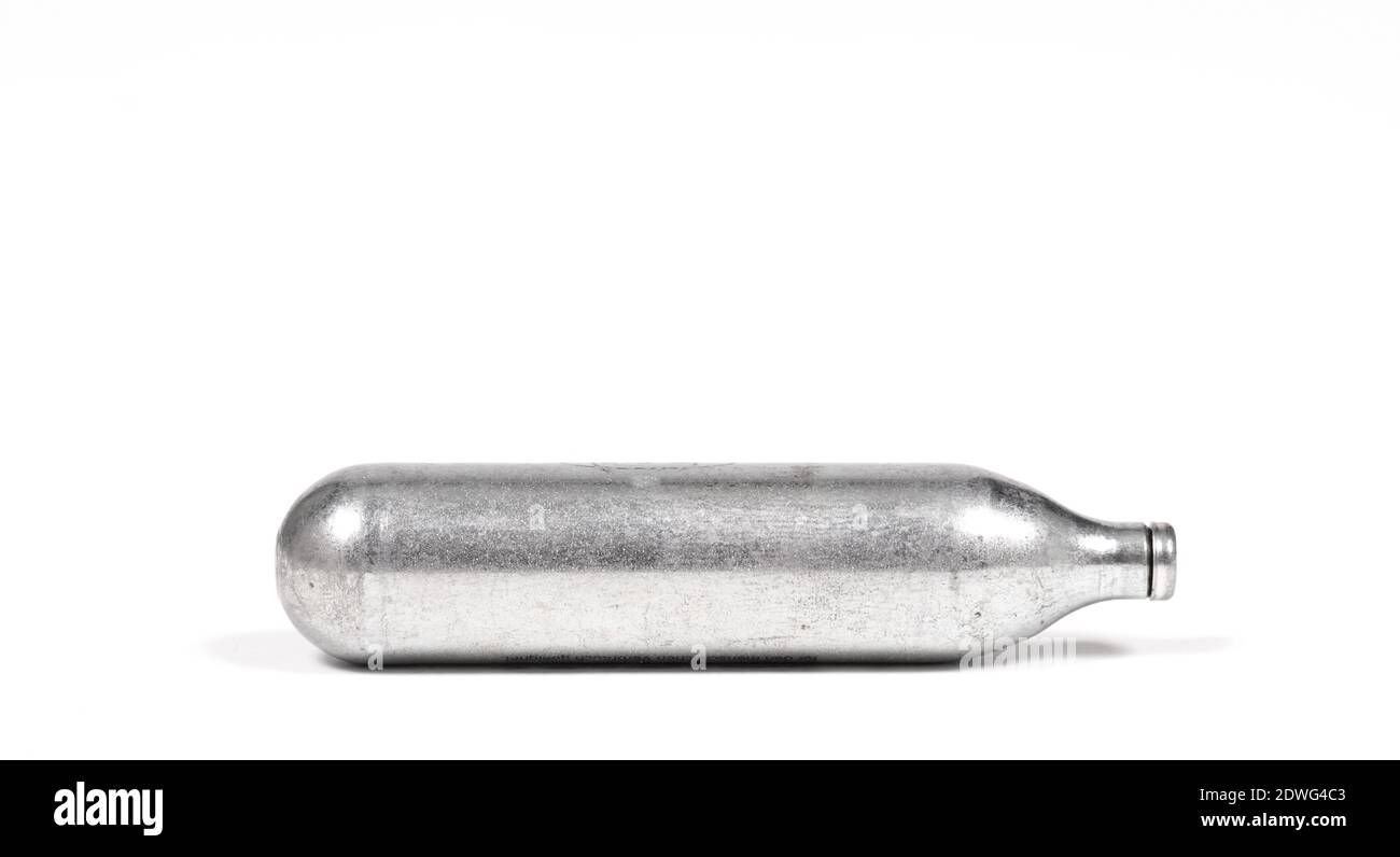Empty canister of laughing gas, isolated on white Stock Photo Alamy