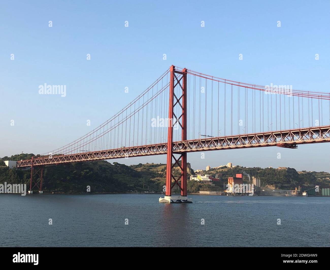 Suspension Bridge Over Sea Stock Photo - Alamy