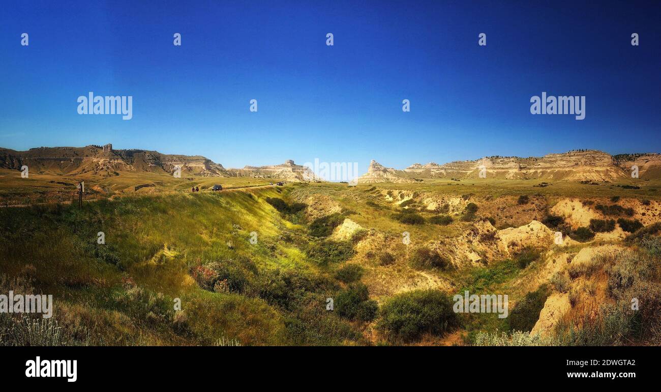 Scenic View Of Landscape Against Clear Blue Sky Stock Photo