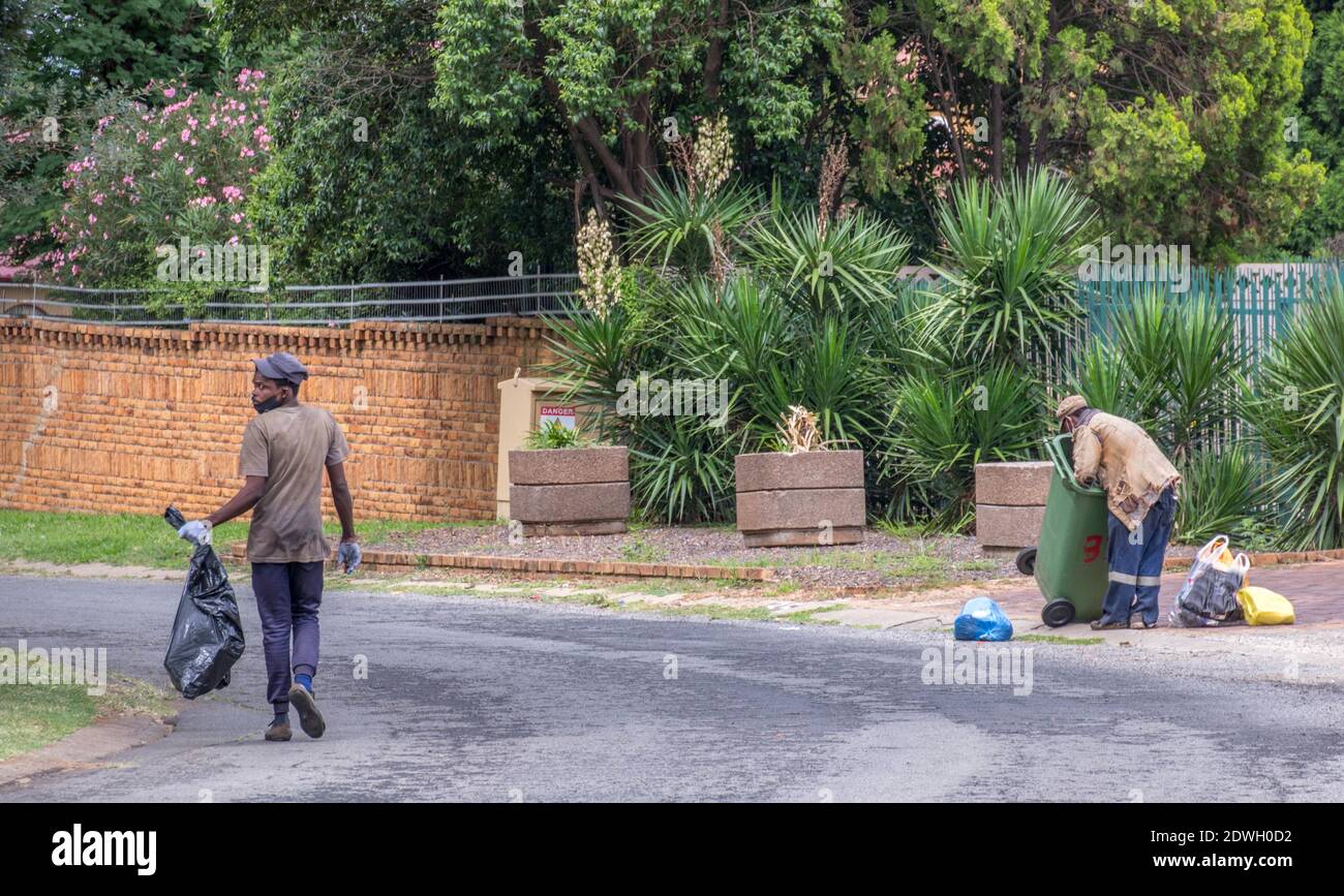 Johannesburg, South Africa dustbin diving to salvage plastic, food