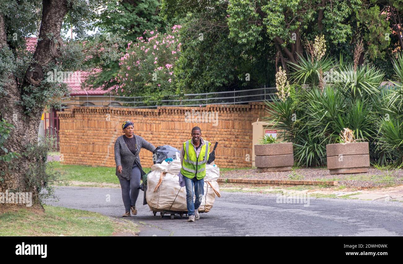 Johannesburg, South Africa dustbin diving to salvage plastic, food
