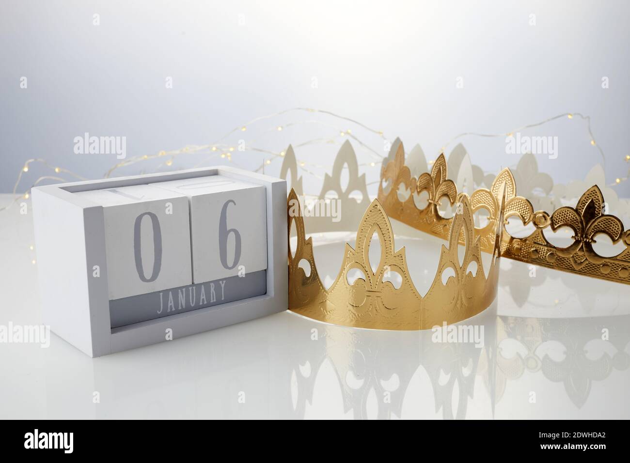 Happy Epiphany day, three kings day. Calendar with king crown on white