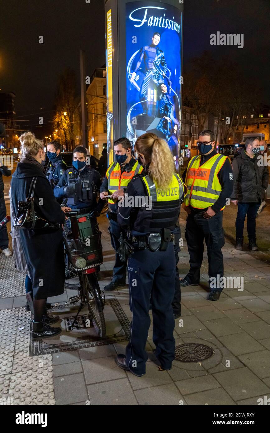 Cooperation of the public order office and the police, checking whether the Corona rules are being observed, people had no masks on when encountered, Stock Photo