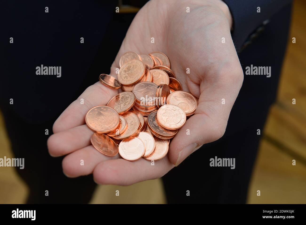 Hand, Centmuenzen Stock Photo