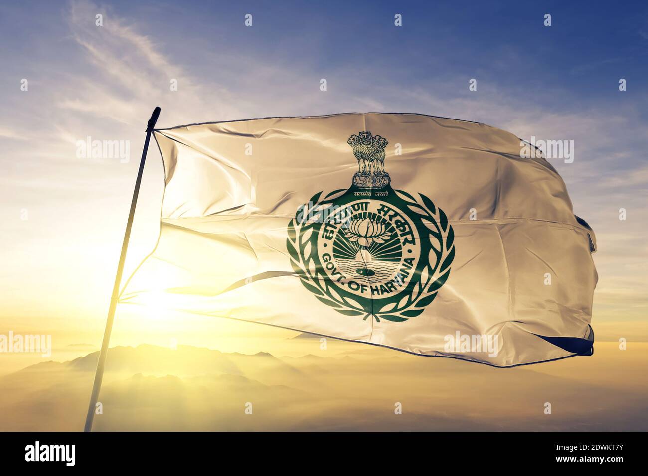 Haryana state of India flag waving on the top sunrise mist fog Stock Photo