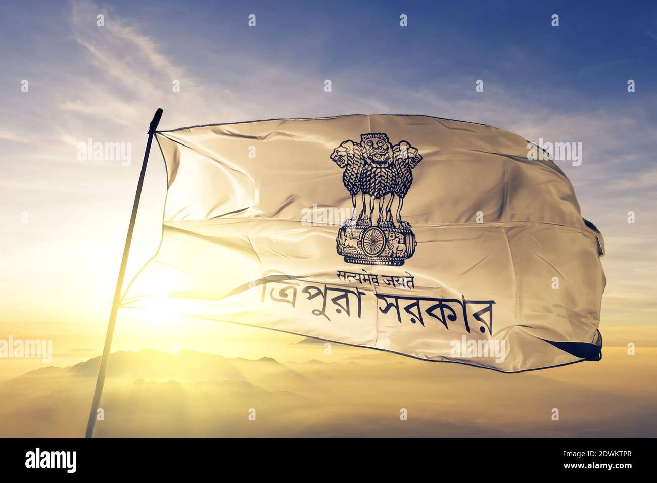Tripura state of India flag waving on the top sunrise mist fog Stock Photo