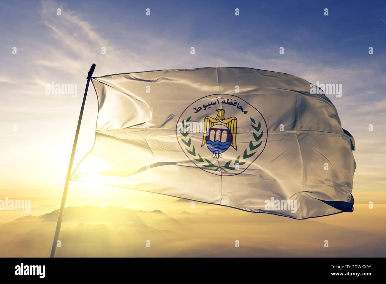 Asyut governorate of Egypt flag waving on the top sunrise mist fog Stock  Photo - Alamy