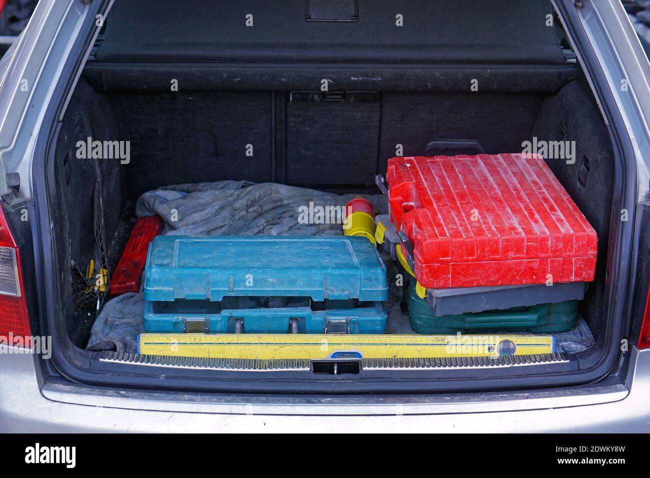 Work tools boxes in car trunk Stock Photo Alamy
