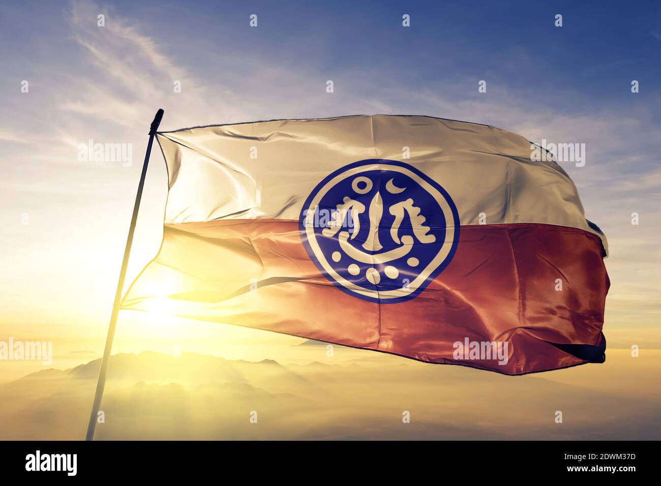 Rakhine state of Myanmar flag waving on the top sunrise mist fog Stock
