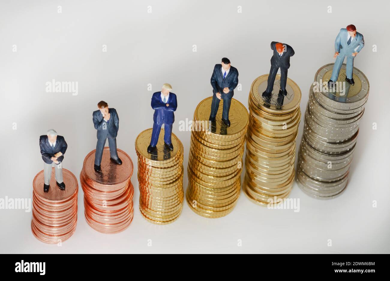 Centmuenzen, Euromuenzen, Miniaturfiguren, Manager Stock Photo